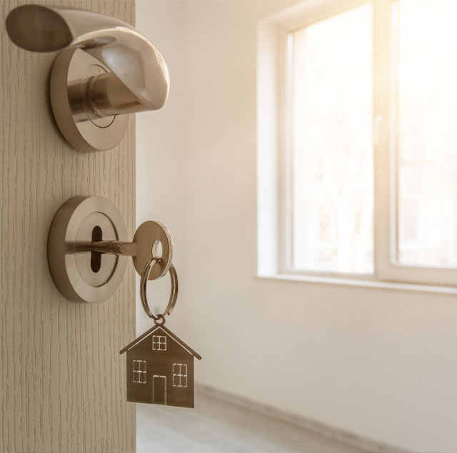 image showing an open door with a key inside 